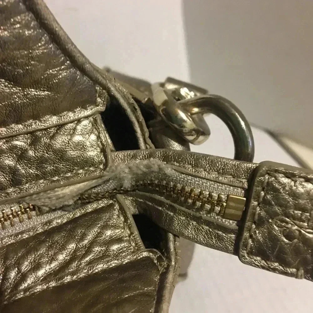 Cole Haan metallic gold leather crossbody handbag